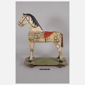Holzpferd auf Rädern