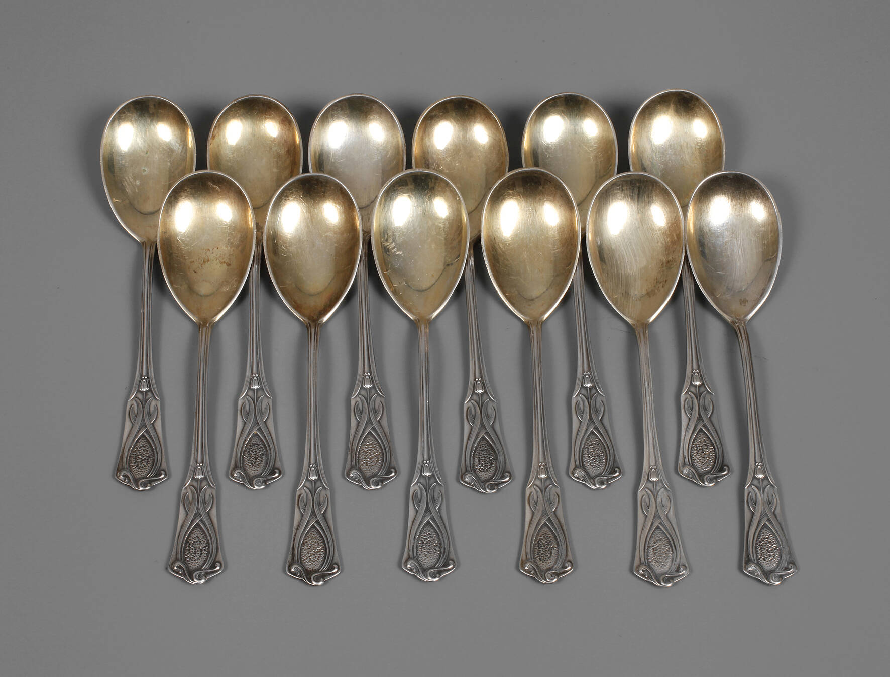 Silber zwölf Dessertlöffel Tulpendekor