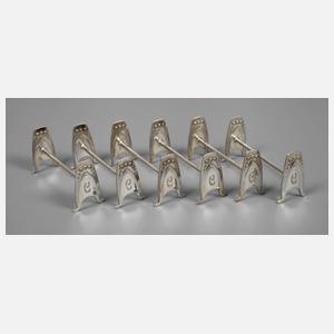 Sechs Jugendstil-Messerbänkchen mit Rosenmotiv