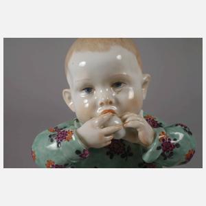 Meissen ”Kind, auf einem Kissen sitzend”