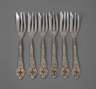 Sechs Kuchengabeln im Rokokostil