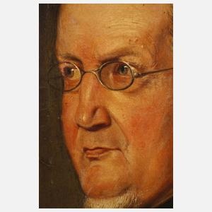 Würdevoller Herr mit Nickelbrille