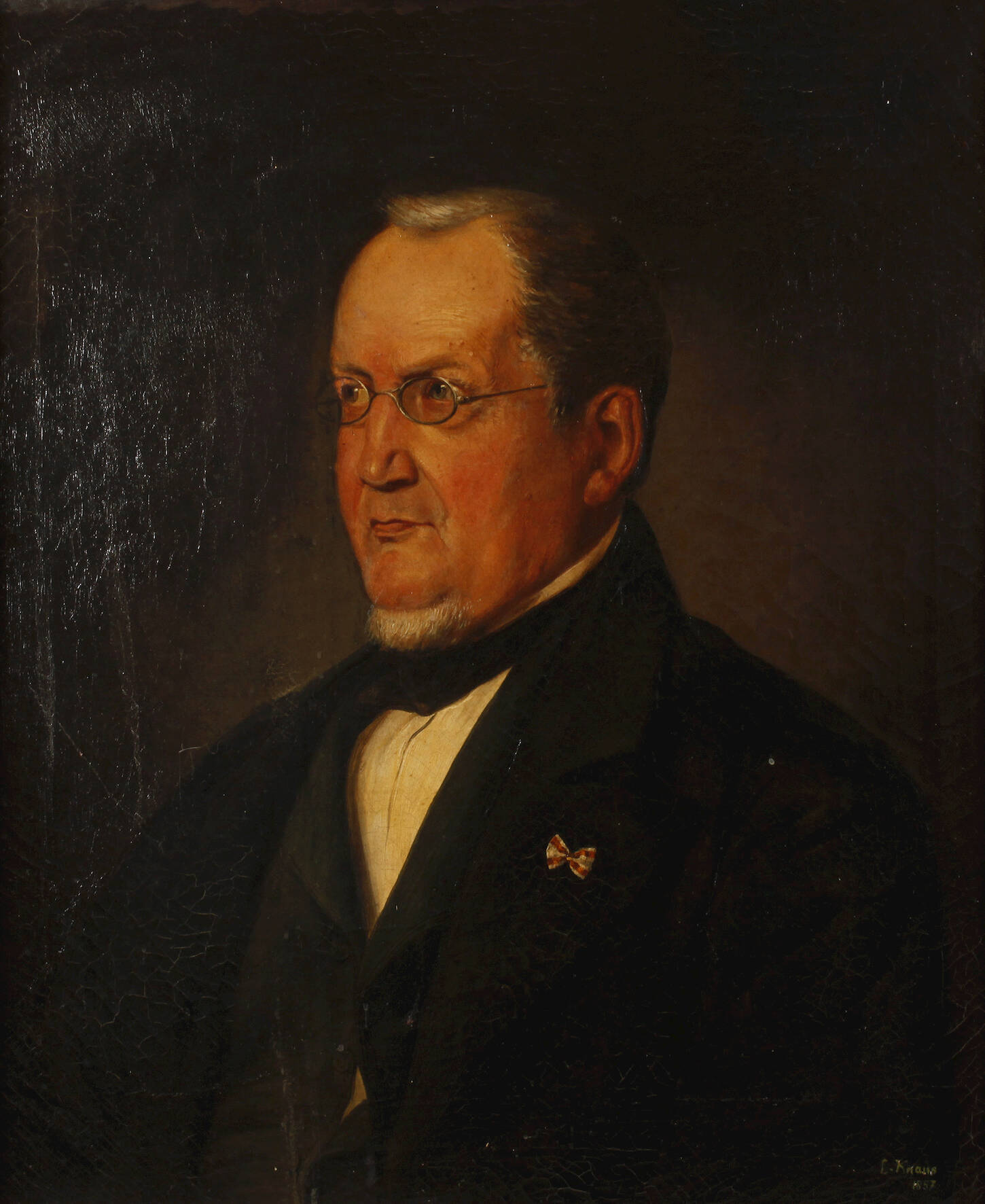 Würdevoller Herr mit Nickelbrille