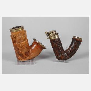 Zwei Pfeifenköpfe