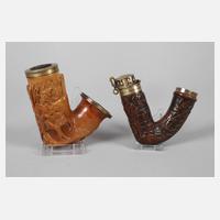 Zwei Pfeifenköpfe111