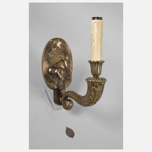 Figürliche Wandlampe