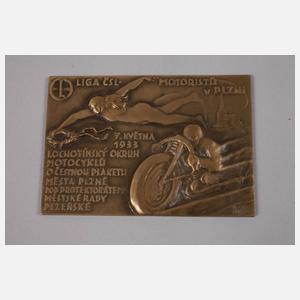 Fünf Motorradplaketten