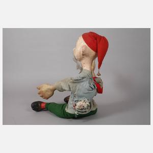 Werbefigur und Teedose