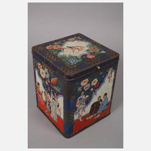 Werbefigur und Teedose