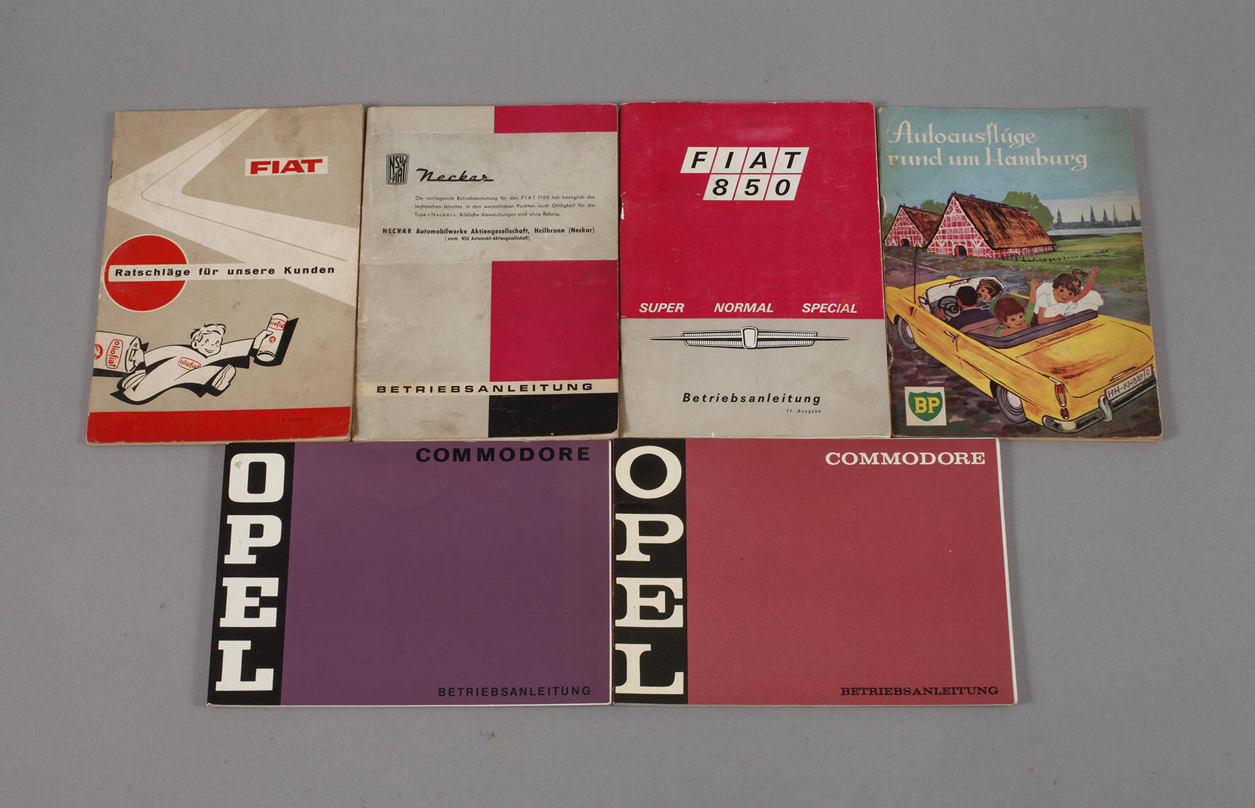 Sechs Automobilbroschüren