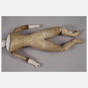 Französische Porzellankopfpuppe mit Brustblatt