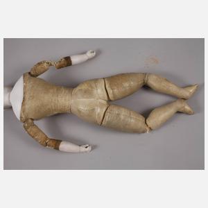 Französische Porzellankopfpuppe mit Brustblatt