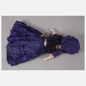 Porzellankopfpuppe mit Brustblatt