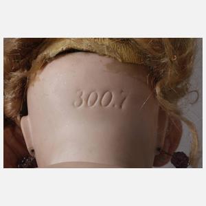 Porzellankopfpuppe mit Brustblatt