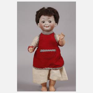Porzellankopfpuppe als Googly