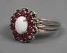 Damenring mit Opal und Rubinen