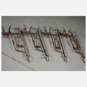 Vier Wandkerzenhalter