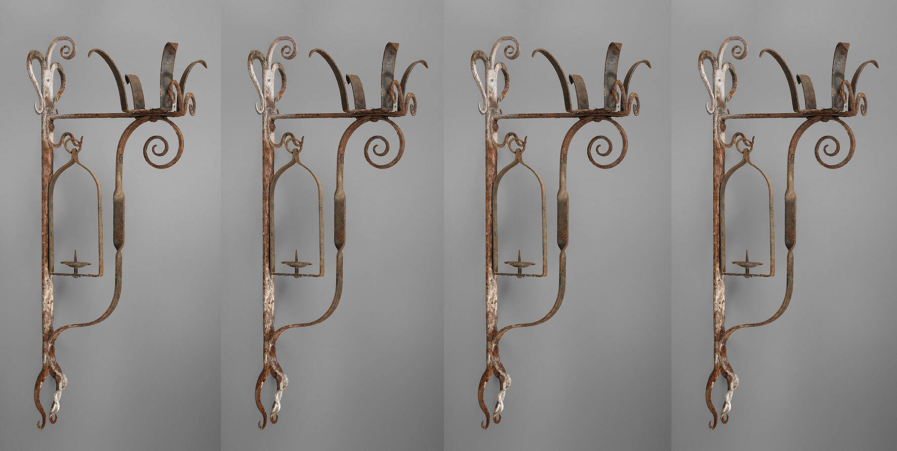 Vier Wandkerzenhalter