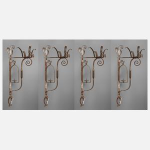 Vier Wandkerzenhalter