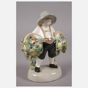 Goldscheider Trachtenfigur mit Blütenkörben