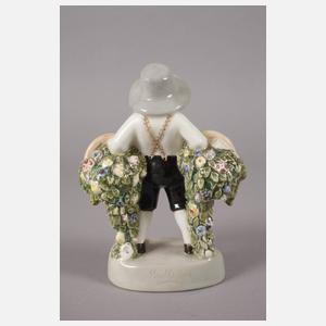 Goldscheider Trachtenfigur mit Blütenkörben