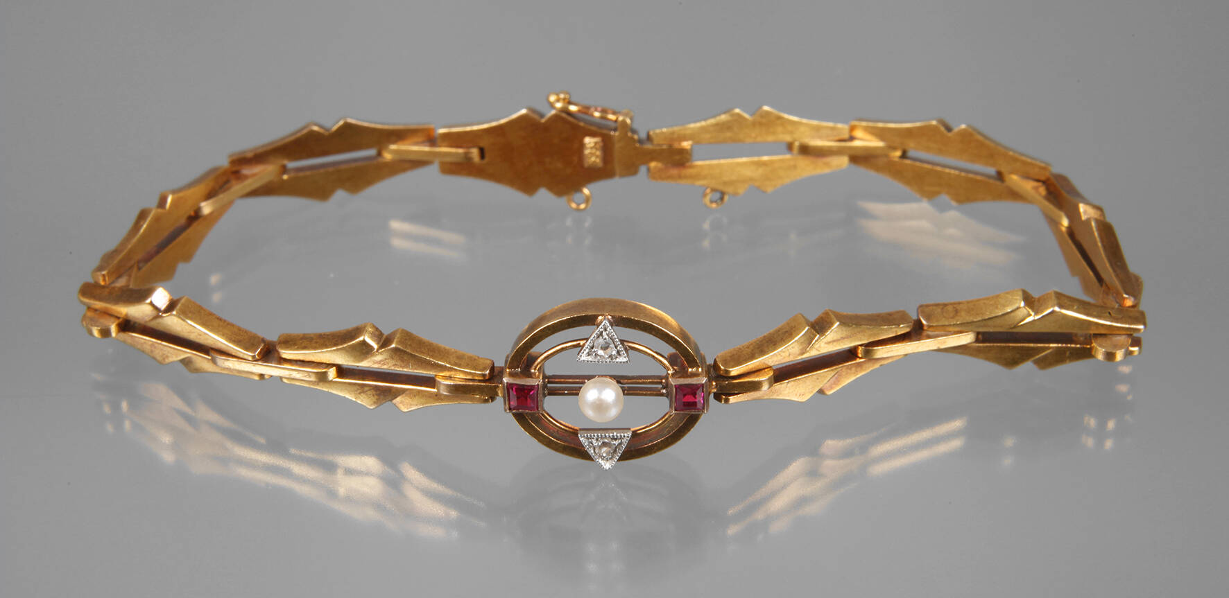 Art déco Armband mit Diamanten, Rubinen und Perle