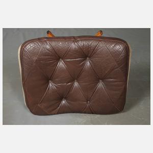 Ledersessel mit Ottomane