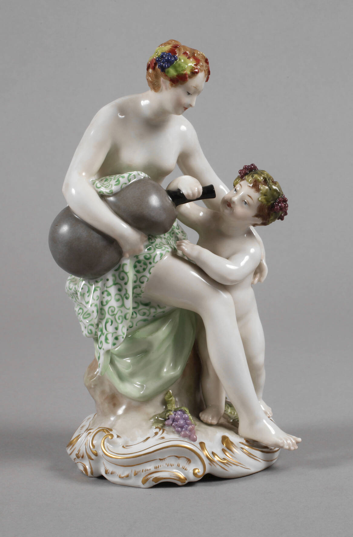 KPM Berlin Bacchantin mit Weinschlauch und Knabe