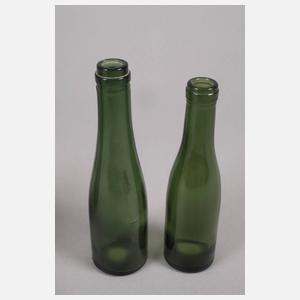 Drei kleine Weinflaschen