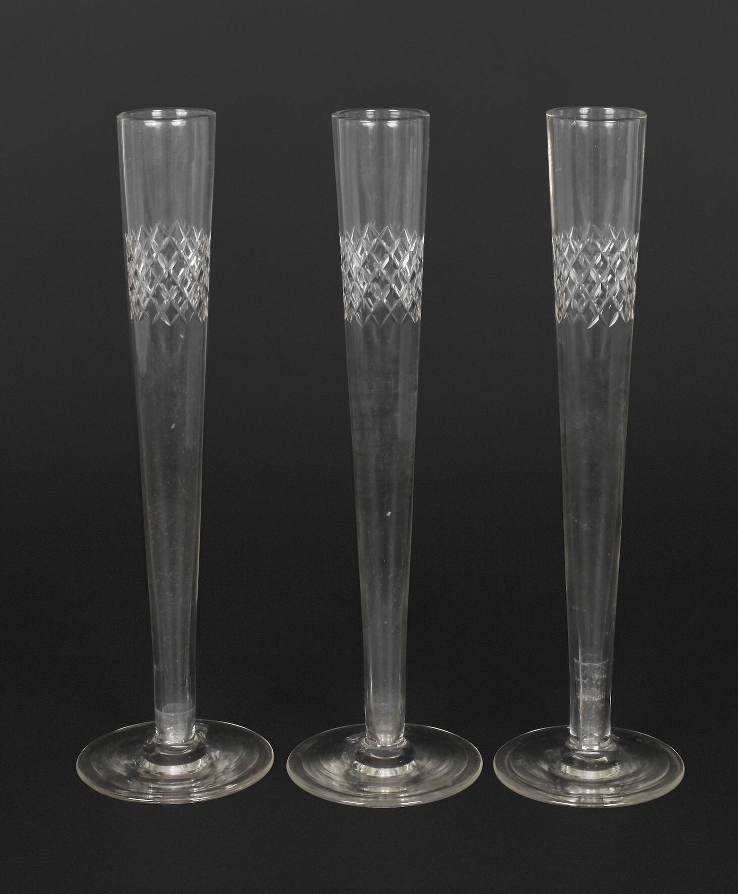 Drei lange Sektflöten