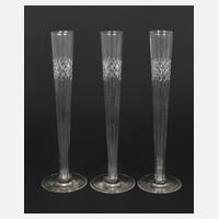 Drei lange Sektflöten111