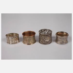 Sieben Serviettenringe Silber