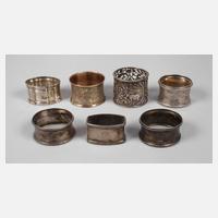 Sieben Serviettenringe Silber111