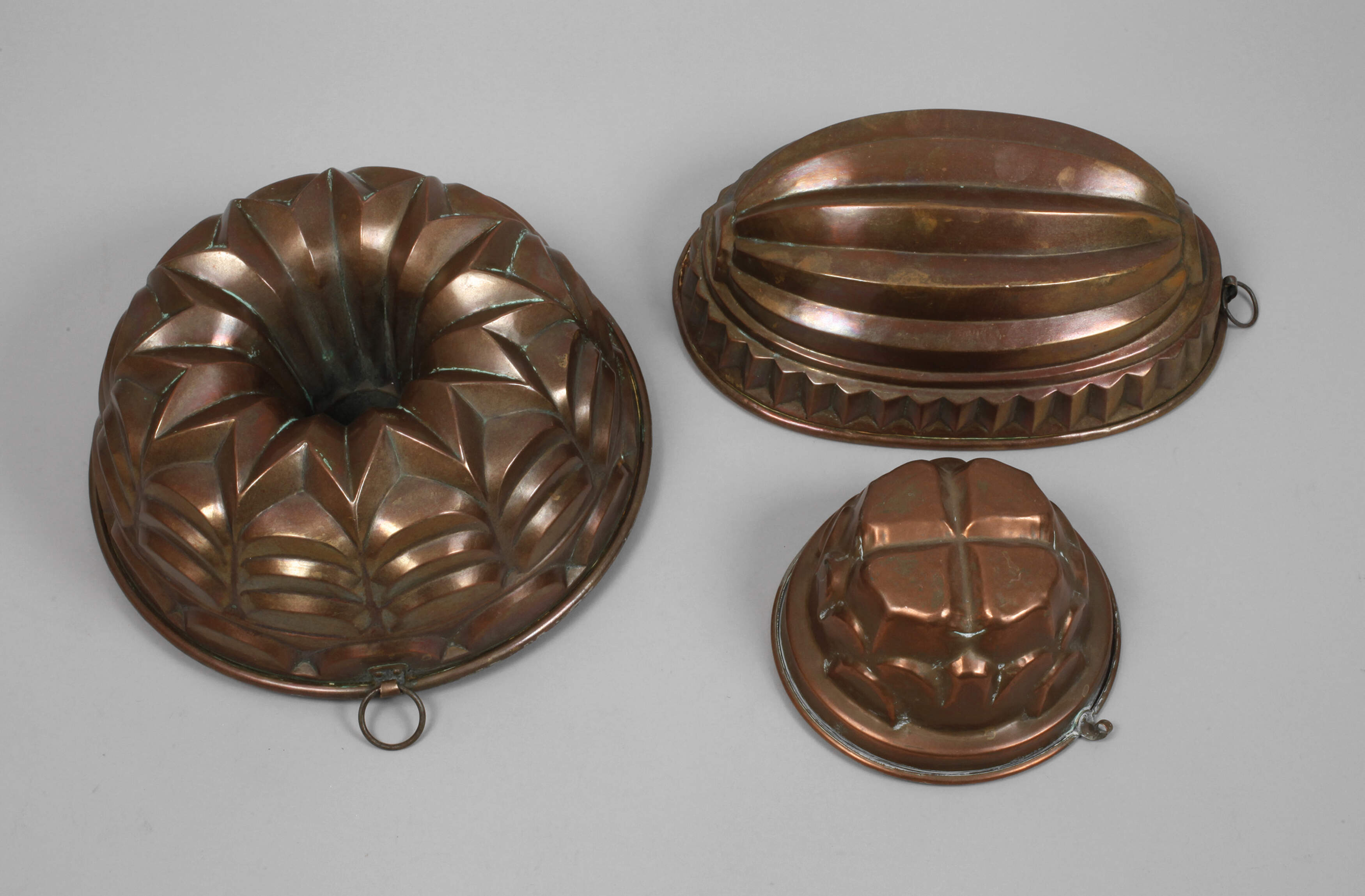 Drei Kupferbackformen