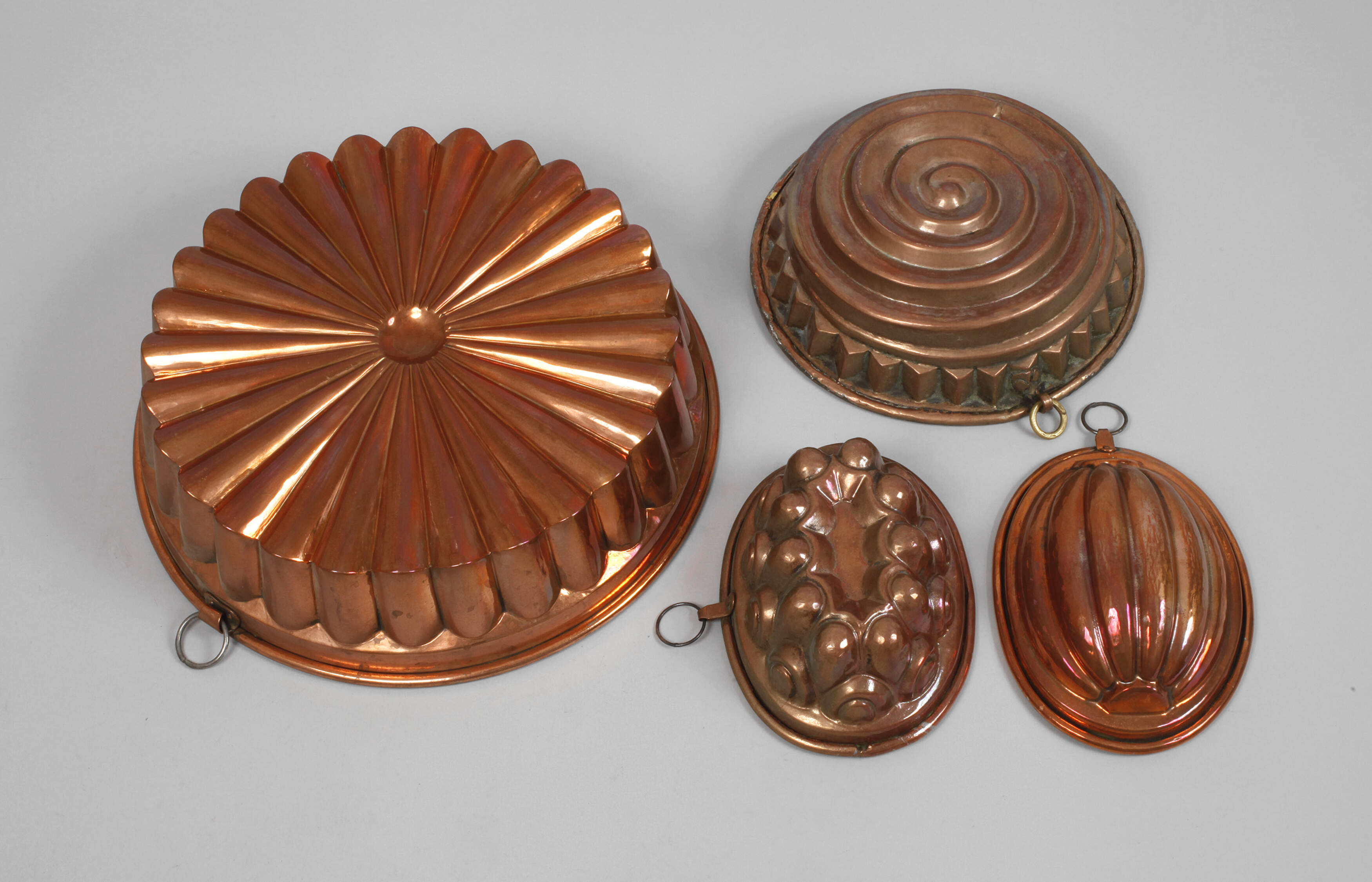 Vier Kupferbackformen