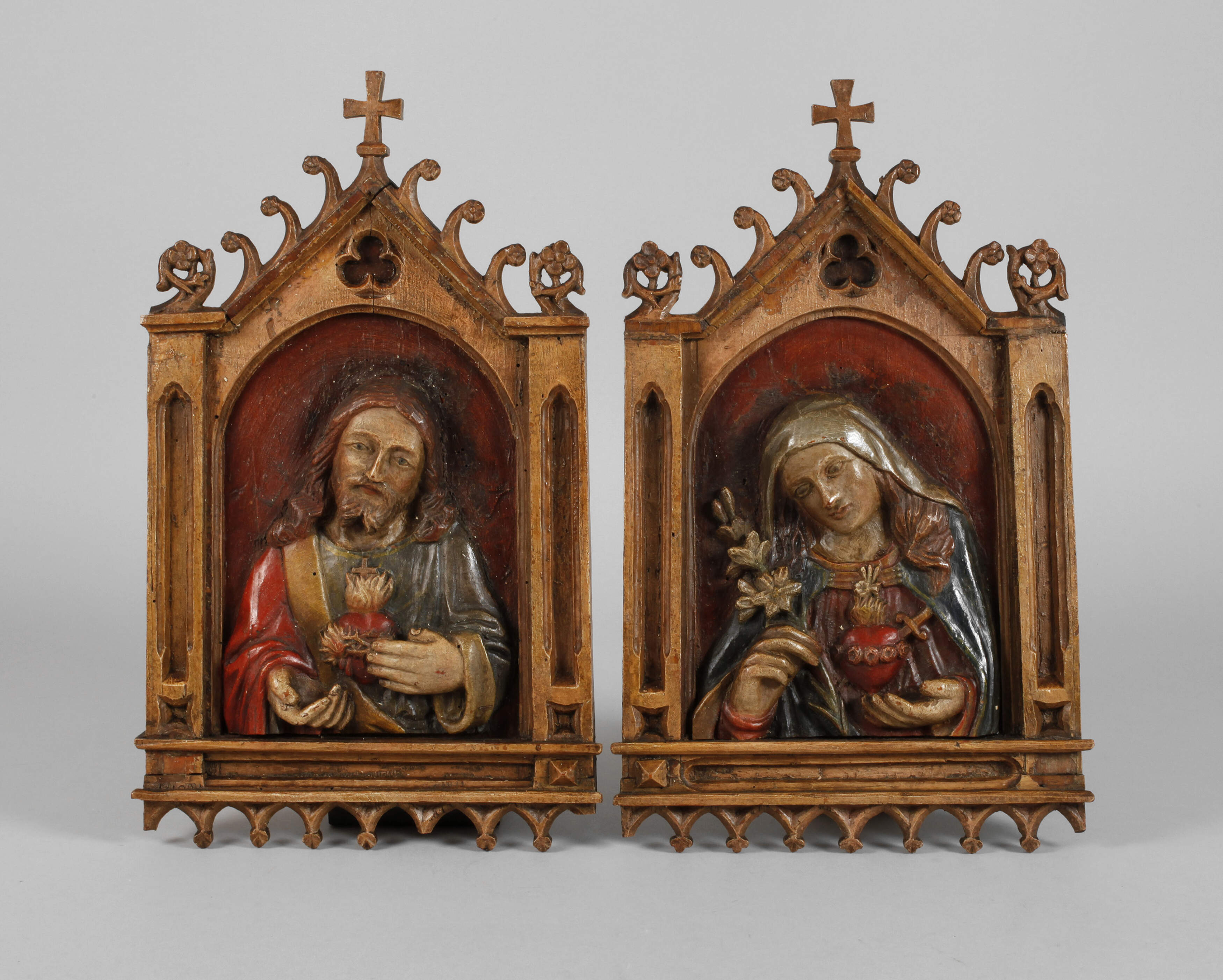 Zwei geschnitzte Andachtsbilder