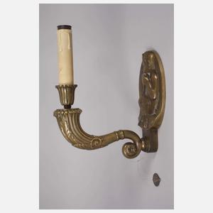 Figürliche Wandlampe