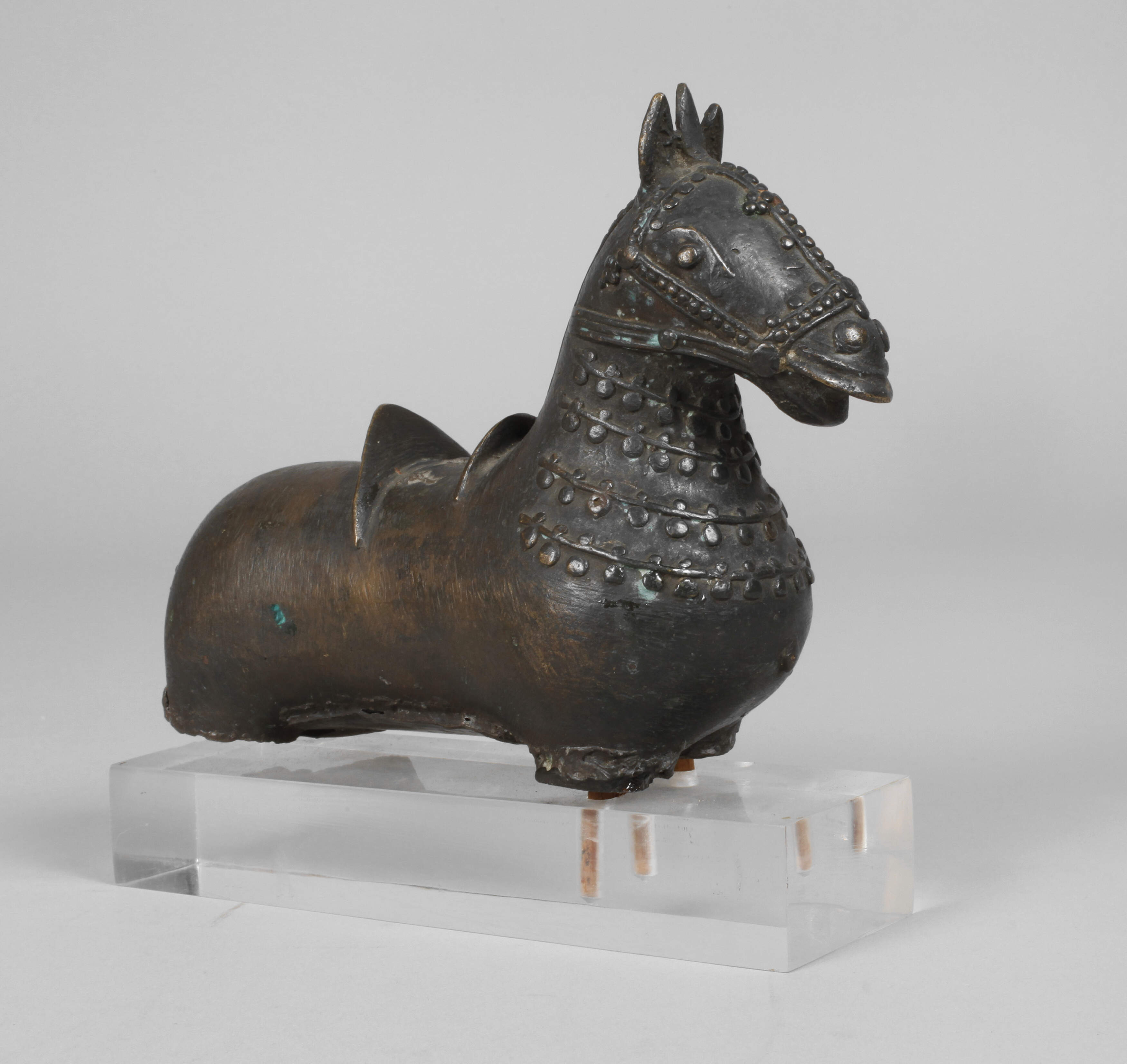 Fragment einer Bronzeplastik