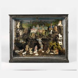 Orientalische Kastenkrippe mit Tragantfiguren