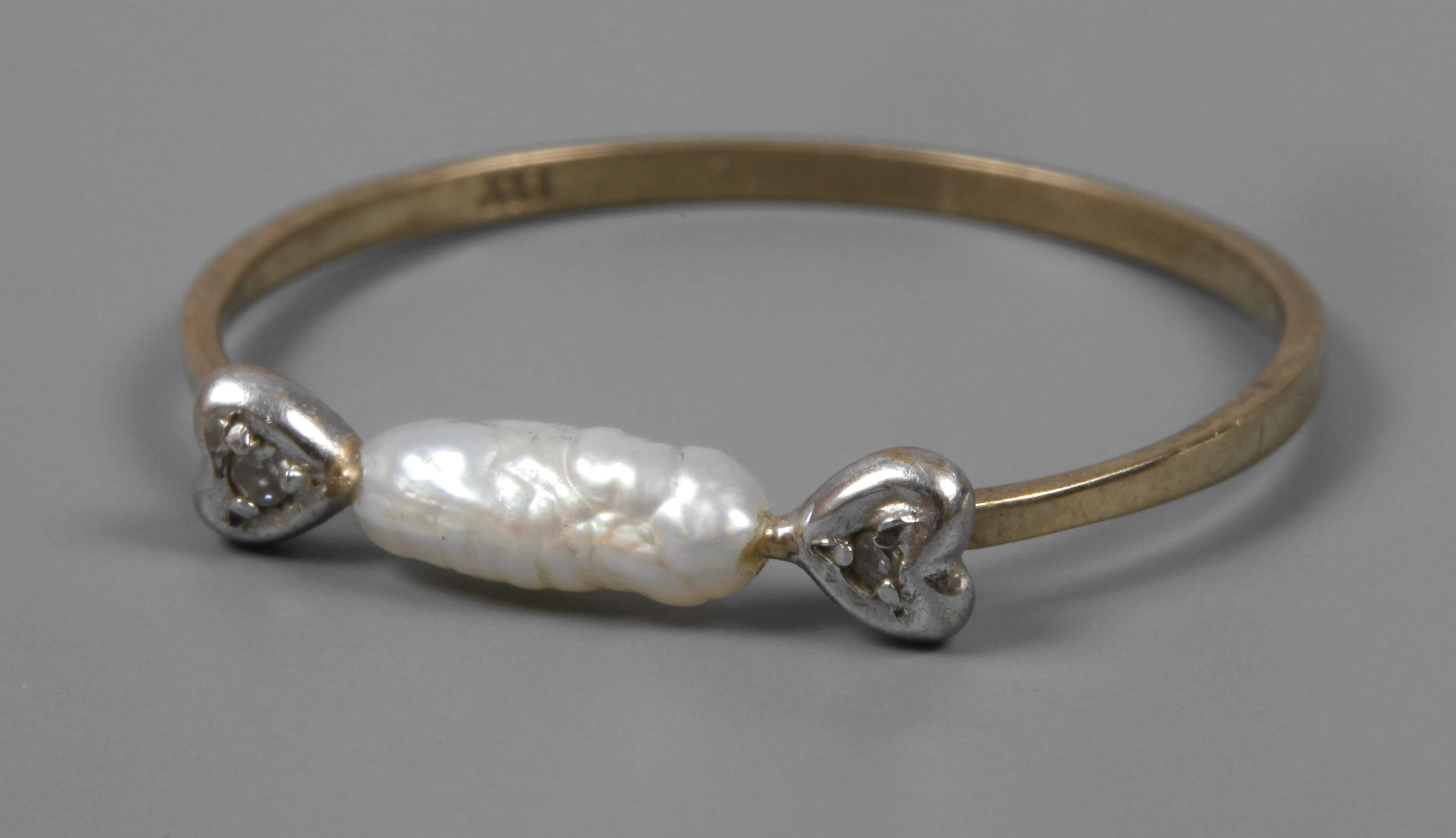 Damenring mit Perle und Diamanten