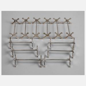 Zwölf Messerbänkchen Silber