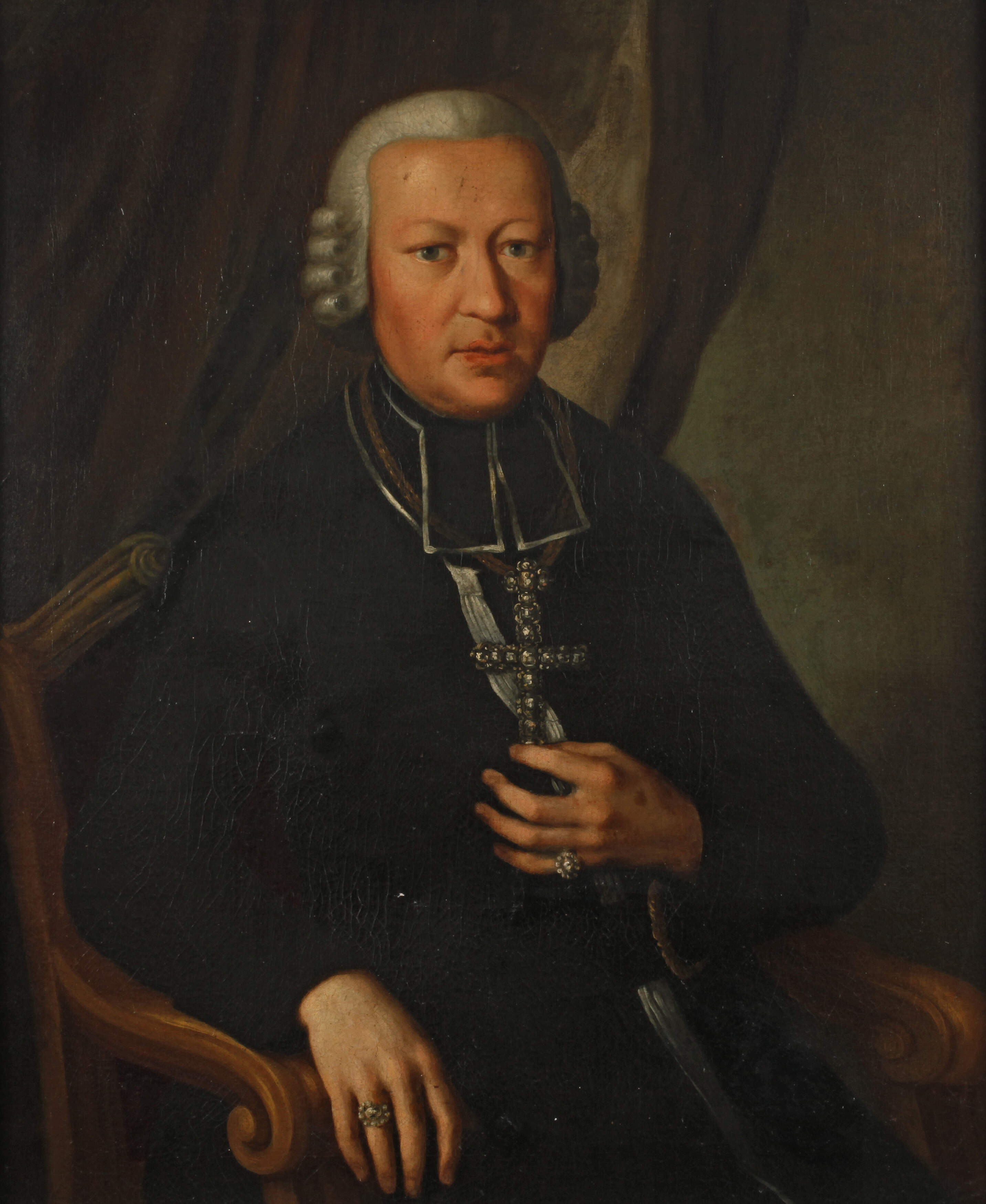 Geistlicher mit Diamantenkreuz