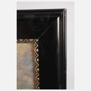 Wachturm an felsiger Küste im Sonnenuntergang