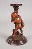 Figürlicher Kerzenleuchter