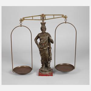 Figürliche Waage