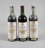 Drei Flaschen Rotwein