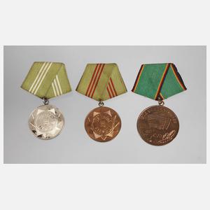 Drei Abzeichen Volkspolizei der DDR