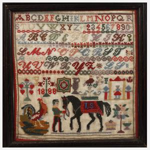 Gerahmtes Stickmustertuch mit Pferdemotiv