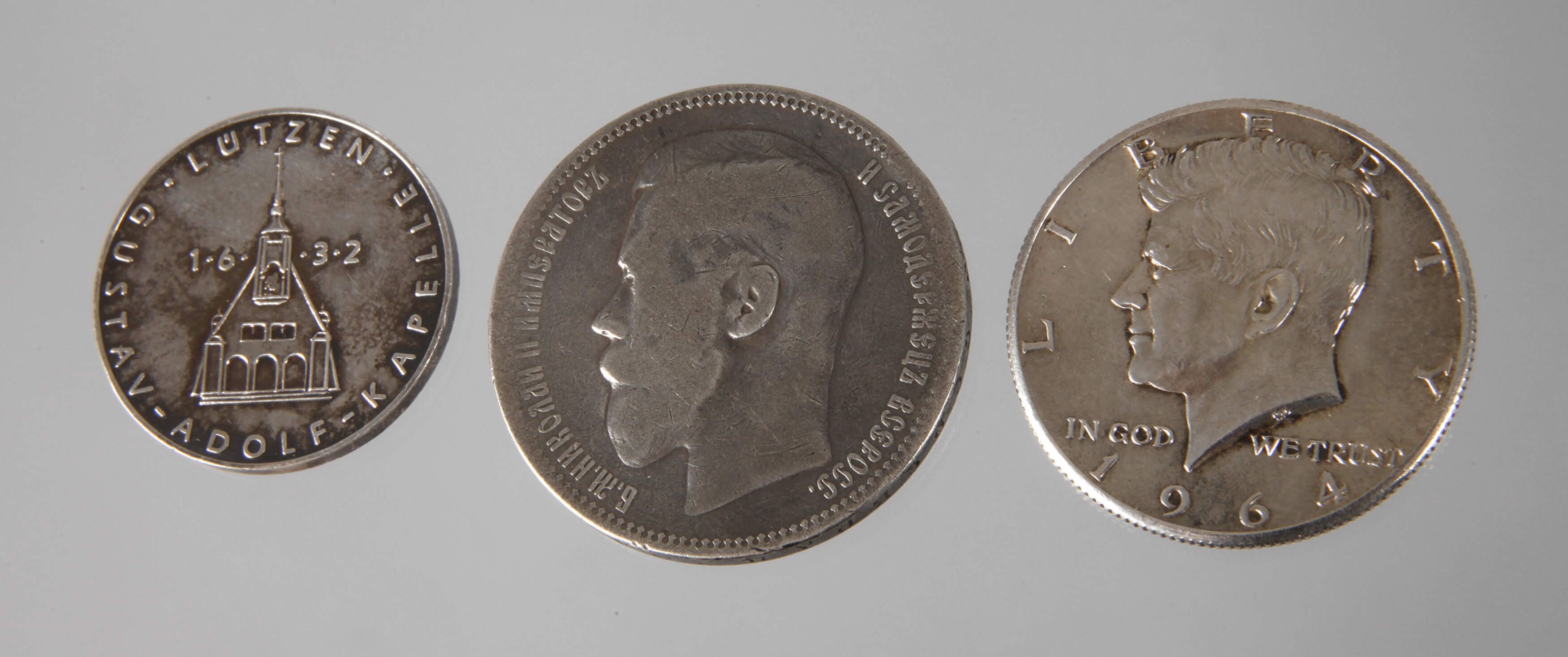 Zwei Silbermünzen + Medaille