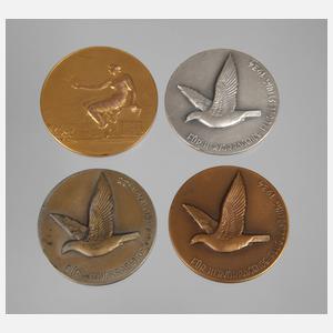 Vier Medaillen Taubenzucht
